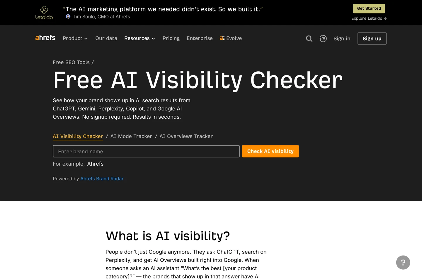 Лендінг Ahrefs Free AI Visibility Checker із полем Enter brand name, кнопкою Check AI visibility і підзаголовком No signup required, results in seconds.